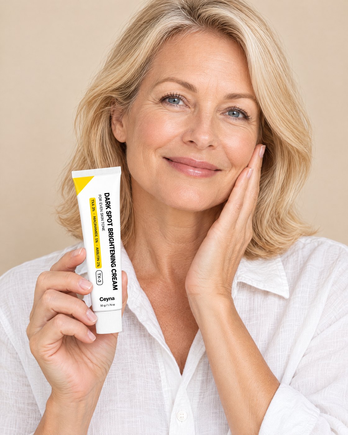 Woman holding the Ceyna tube, even skin tone after 8 weeks