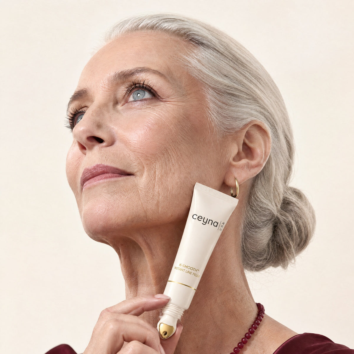 Woman holding CEYNA K-Smooth Instant Line Filler